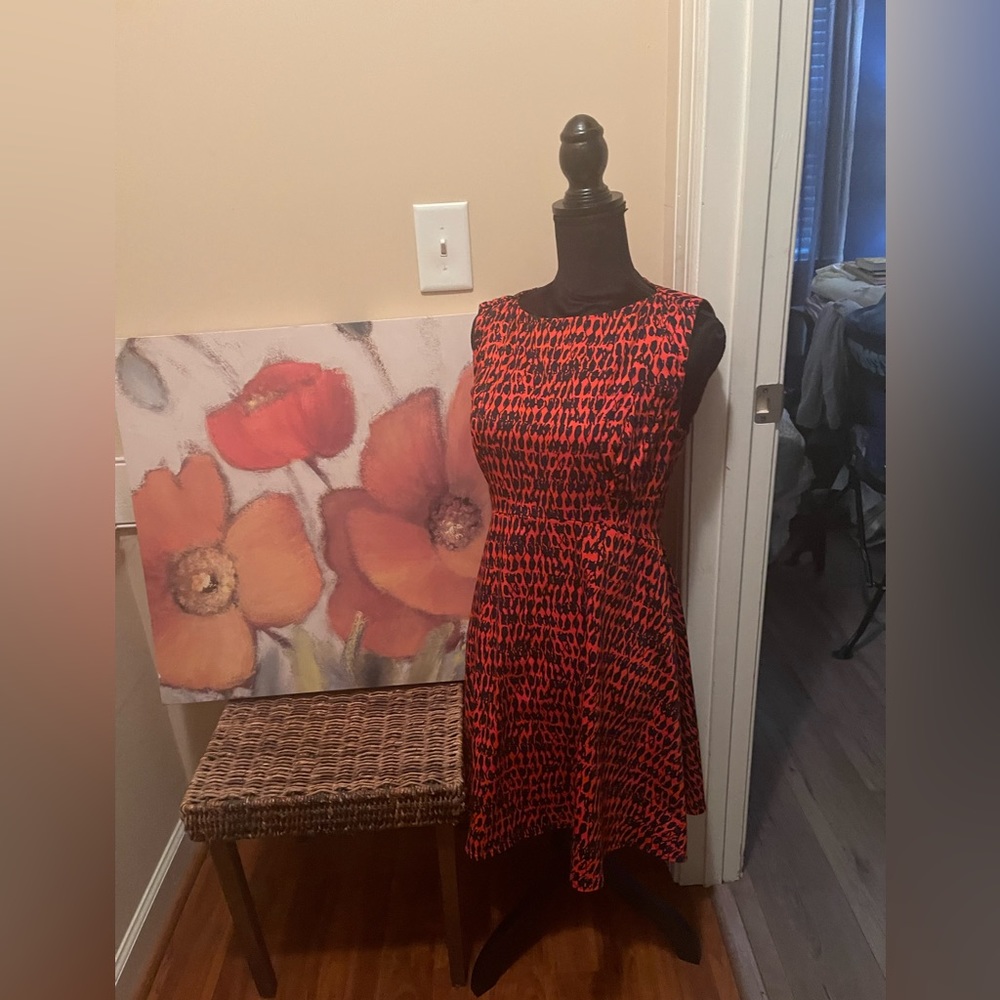 This beautiful A-line dress is bold with color and absolutely gorgeous!!